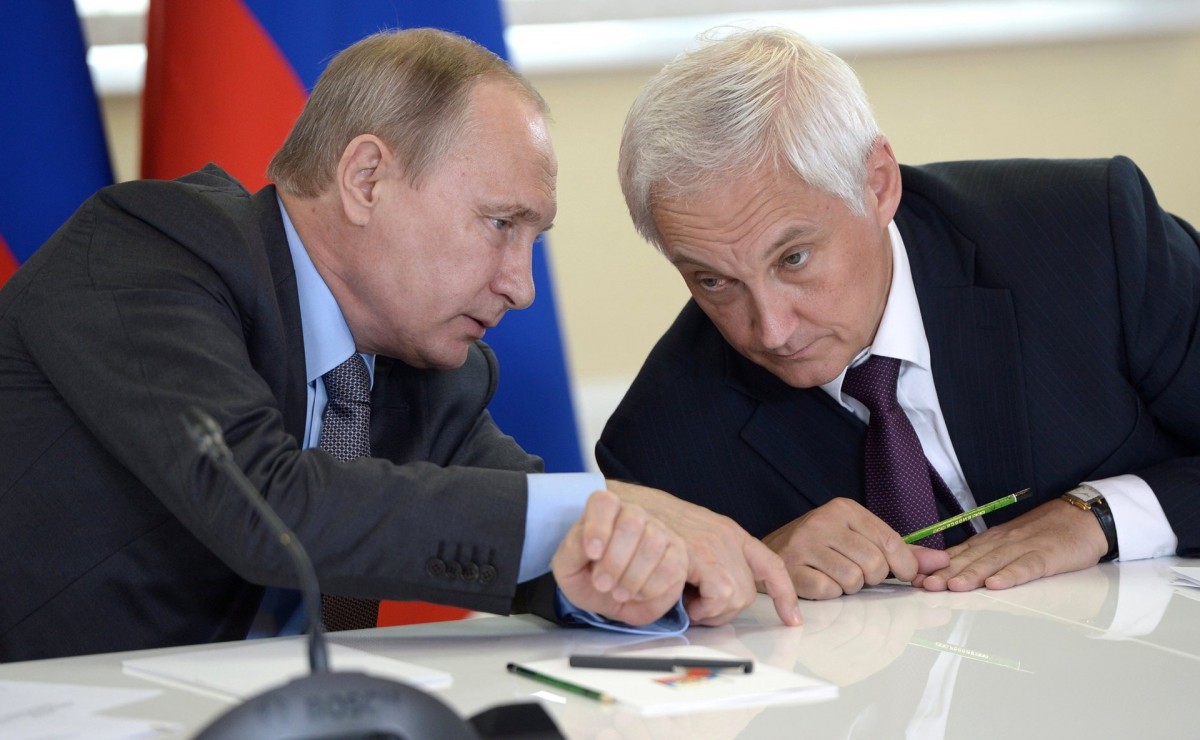 Russian President Vladimir Putin speaks with Andrei Belousov