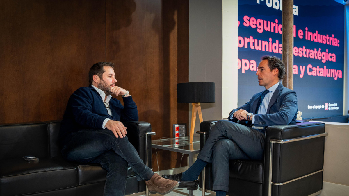 Marc López Plana (left) and Javier Colomina (right) chat at the Palau Macaya in Barcelona.